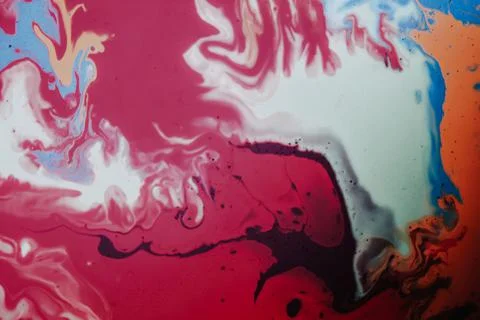 Mixed stains creating an abstract pattern in the water - a cool background 写真素材