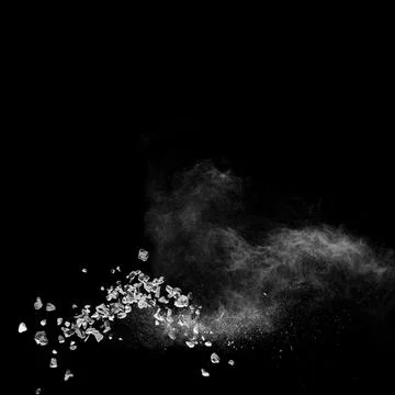 Mixed stone explosion on black background. Stock Photos