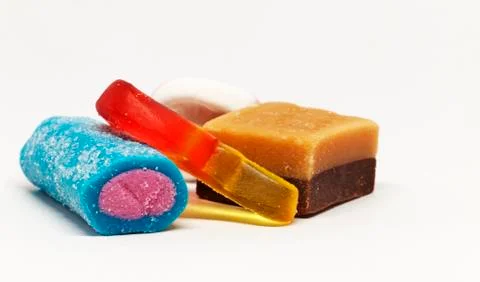 Mixed sweets on white background Stock Photos