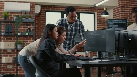 Mixed team of software engineers brainstorming ideas for new cloud computing Stock Footage 168234228