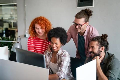 Mixed team of software engineers brainstorming ideas. Diverse app developers 库存照片