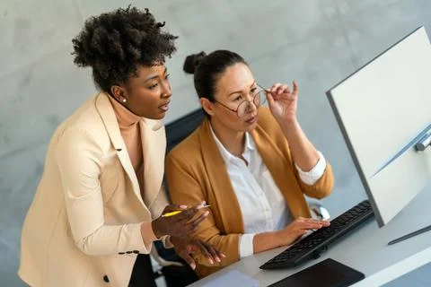 Mixed team of software engineers brainstorming ideas. Diverse app developer.. 库存照片