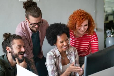 Mixed team of software engineers brainstorming ideas. Diverse app developer.. 库存照片