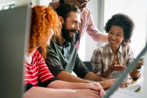 Mixed team of software engineers brainstorming ideas. Diverse app developer.. 库存照片