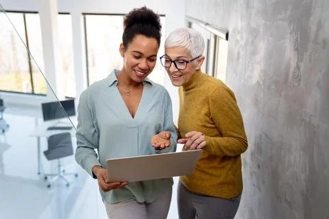 Mixed team of software engineers brainstorming ideas. Diverse app developer.. Stock Photos