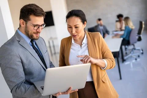Mixed team of software engineers brainstorming ideas. Diverse app developer.. Stock Photos