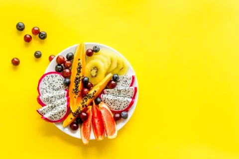 Mixed tropical exotic fruit in white dish Stock Photos