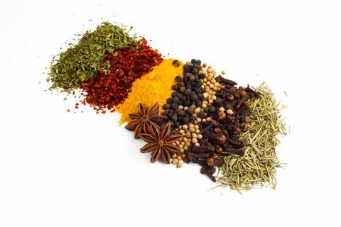 Mixed various spices on the white background Stock Photos