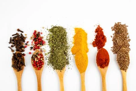 Mixed various spices on the white background Stock Photos