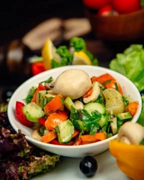 Mixed vegetable salad with herbs Stock Photos