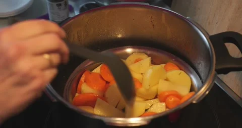 Mixed vegetables in cooking pan 4K footage Stock Footage 298846080