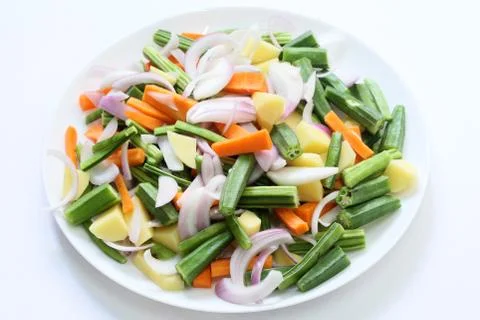 Mixed vegetables in a plate background Stock Photos