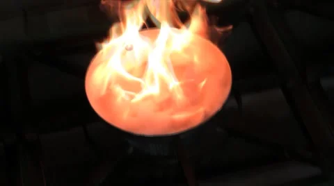 Mixed veggies (onion) burst into flame! shot. Stock Footage 59923858
