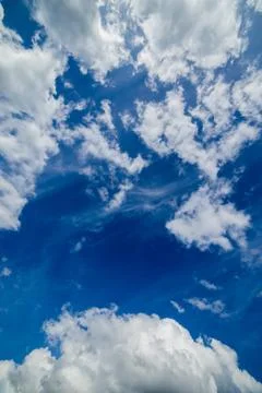 Mixed zenith clouds at noon daylight wide angle shot Photos