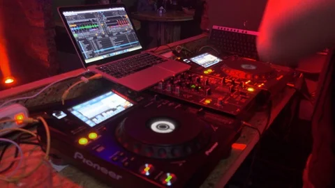 Mixer and notebook, DJ playing music, mixing sound. Stock Footage 88440354