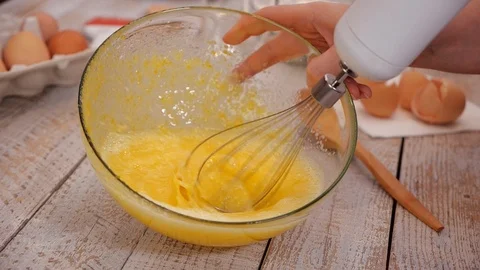 Mixer blend the sponge-cake ingredients, slow motion Stock Footage 106219929