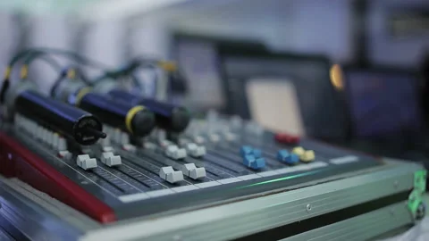 Mixer control of the sound engineer standing on the table at a public event. Stock Footage 129704209