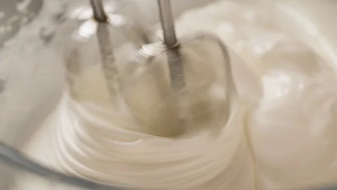 Mixer is mixing Cream Close up Macro shot Slow motion Stock Footage 103041480