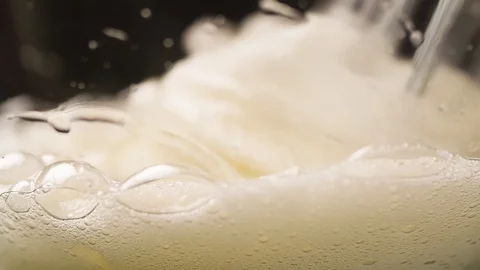 Mixer is mixing Egg White Close up Macro shot Slow motion cooking video Stock Footage 103041335