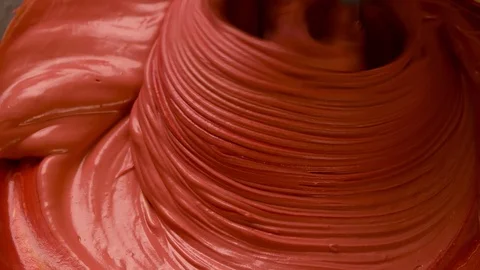 Mixer is mixing red pink Cream Close up Macro shot top view Stock Footage 103041925