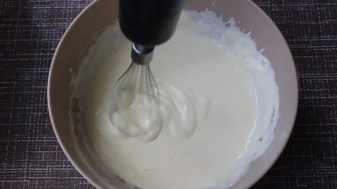 Mixer is stirring the pancake batter Stock Footage 133398976