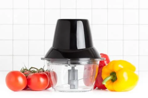 Mixer with vegetables in kitchen Stock Photos
