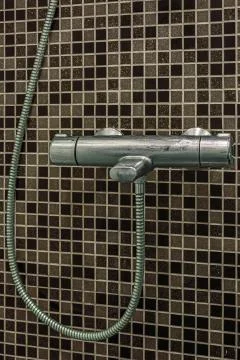 The mixer on the wall. Stock Photos