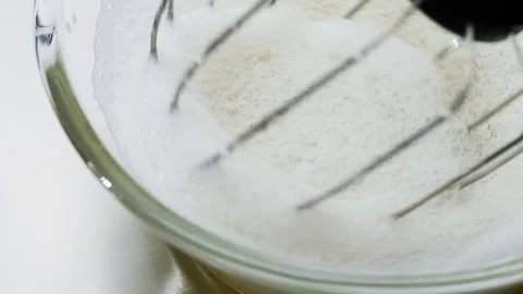 Mixer whips up egg white Stock Footage 129083121