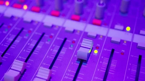 Mixers with various lights, knobs, and buttons. To creating your next hit Stock Footage 267470962