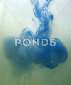 Mixing acrylic paints in water.. Stock Photos