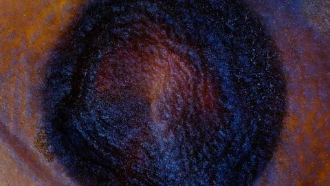 Mixing alcohol ink to create unique patterns on a surface Foto stock