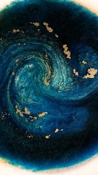 Mixing alcohol ink creates blue and gold swirls on a surface Stock Illustration