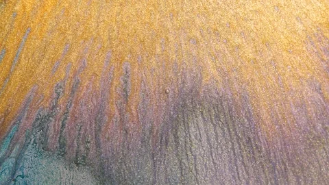 Mixing of alcohol ink creates colorful patterns and textures in abstract art Stock Footage 344720423