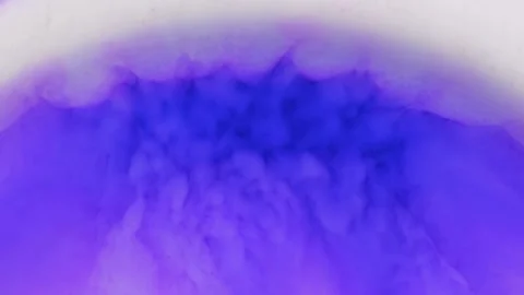 Mixing alcohol ink creates patterns in fluid art on a dark surface Stock Footage 344656396
