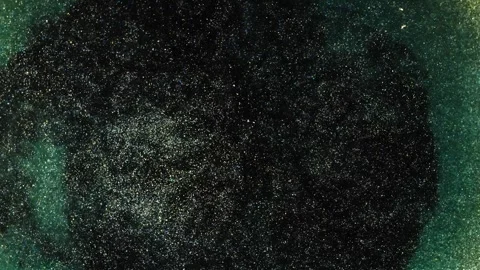 Mixing alcohol ink creates patterns and textures in a circular shape Stock Footage 344719197