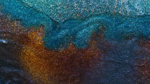 Mixing of alcohol ink in macro view showing vibrant textures and patterns Stock Footage 344725041
