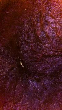 Mixing alcohol ink in macro view showing colorful patterns and textures Stock Photos