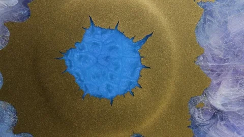 Mixing alcohol inks and epoxy resin to create a colorful close-up art piece Stock-Footage 342976238