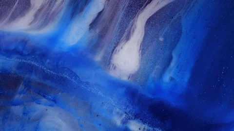Mixing alcohol inks and epoxy resin in different colors close-up view Stock Footage 342977481