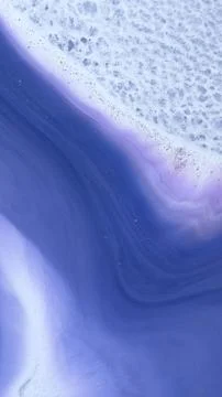 Mixing alcohol inks and epoxy resin in a close-up view Stockillustratie