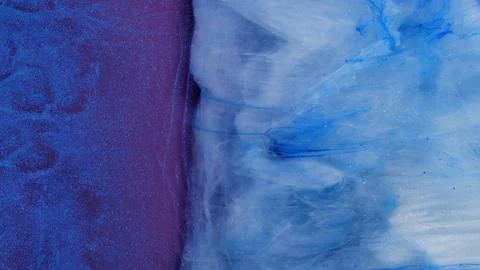 Mixing alcohol inks and epoxy resin with different colors in close-up view Stock Photos