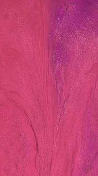 Mixing alcohol inks of different colors in a creative process Stock Photos