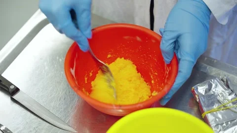 Mixing and crushing eggs with a fork closeup Stock Footage 315505755