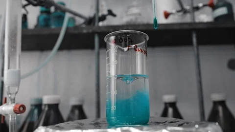 Mixing and homogenization chemical process in lab experiment. Medical, pharmacy Stock Footage 104583153