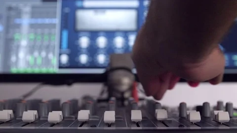 Mixing audio in a studio Stock Footage 80840737