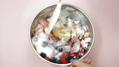 Mixing berries with sugar Stock Footage