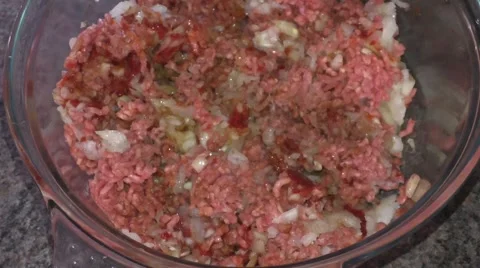 Mixing the burger by hand Stock Footage 46987433
