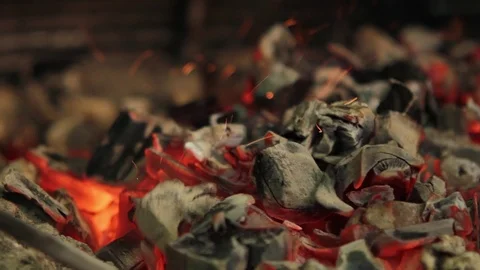 Mixing of Burning Coals in the Fire Stock Footage 101435210