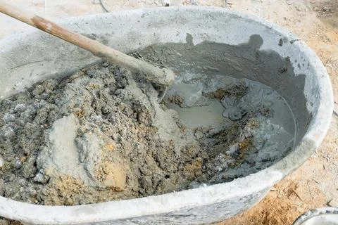 Mixing cement for construction projects job site process image industrial e.. Stock Photos
