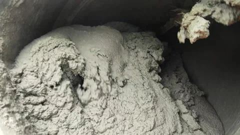 Mixing cement on construction site Stock Footage 214655360